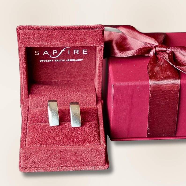 Sterling silver rectangular stud earrings presented in premium gift box