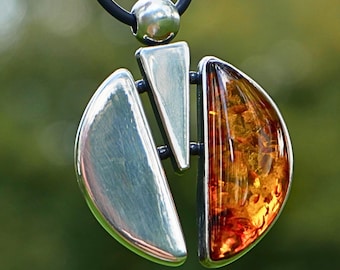 Modern Geometric Cognac Baltic Amber Pendant In Sterling Silver On Quality Silicone Jewellery Cord