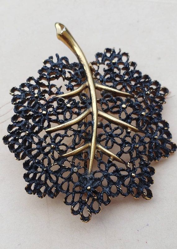 Mamselle black filigree leaf brooch