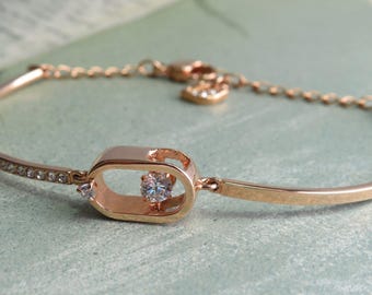 Swarovski Swan Signed Rose Gold Colored ‘Sparkling Dance North’ Bracelet w/Floating Crystal    ZJ23