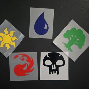 May include: Five square stickers featuring symbols from a fantasy card game. The symbols include a yellow sun, a blue water drop, a green tree, a red flame, and a black skull.