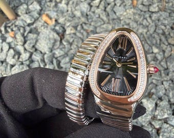 Vintage watch black serpentine double gold diamond