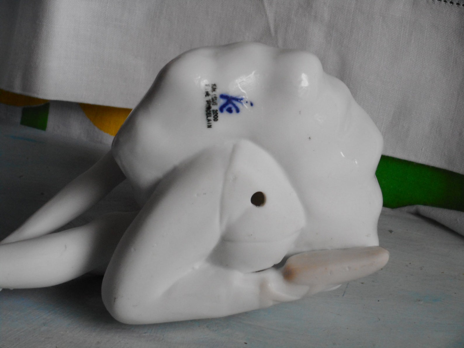vintage fine porcelain ballerina. very soft blue and white dress. light beige hair and shoes. ballet dancer.