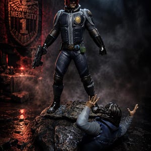 May include: A detailed action figure of Judge Dredd in a dark, gritty setting. The figure wears a black and navy uniform with a red helmet and holds a gun. A defeated figure lies at his feet, with the Mega-City 1 emblem in the background.