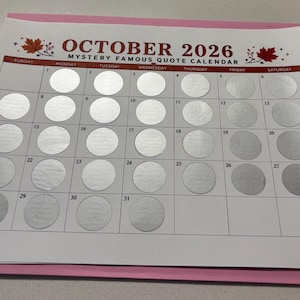 May include: A white October 2026 calendar page with a pink border, featuring the text "OCTOBER 2026 MYSTERY FAMOUS QUOTE CALENDAR" and red maple leaf graphics. Each day from 1 to 31 contains a circular silver scratch-off sticker.