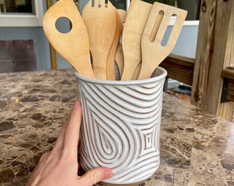 Stoneware pottery utensil jar with hand carved fingerprint design in Limestone glaze (stony off white)