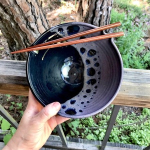 Ramen bowl with chopstick rest in Midnight glaze (subdued eggplant purple and glossy black) Wheel thrown, dishwasher safe. SOLD INDIVIDUALLY