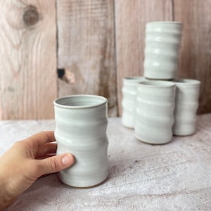 Casual wheel thrown tumblers, juice cups in Stoney White glaze. Cream, off white, limestone white. SOLD INDIVIDUALLY