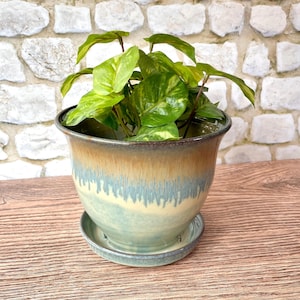 Ceramic planter (lg size) with attached drip dish in Patina glaze- 7.5" wide x 6.25" tall. Wheel thrown stoneware pottery