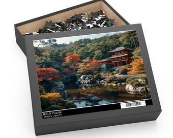 May include: An open black puzzle box displaying a Japanese garden scene with a red temple, trees, and a pond. The box contains puzzle pieces. The box has the text "8x10 Puzzle 120 pcs Ages 9+". The puzzle measures 20.32 x 25.4 cm.