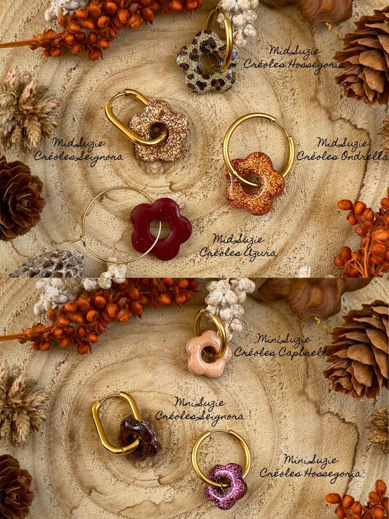 May include: A collection of flower-shaped earrings in various colors, including gold, glittery bronze, burgundy, and leopard print. Each earring has a gold hoop. The text "Mid Suzie" and "Mini Suzie" are visible.