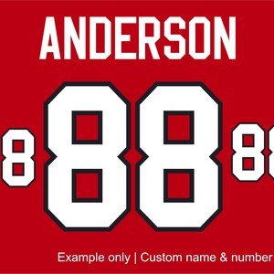 May include: Red background with the name "ANDERSON" in white block letters. Large white number "88" with black trim is centered. Smaller "88" on either side. Text at the bottom reads "Example only | Custom name & number."