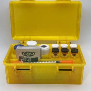 May include: A set of three ceramic mugs with a speckled, matte finish. The mugs are in shades of cream, light gray, and dark gray. Each mug has a simple, minimalist design and a rounded handle.