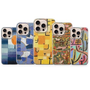 May include: Five phone cases with colorful abstract art designs. The cases feature various patterns, including geometric shapes, brushstrokes, and organic forms in shades of blue, yellow, orange, and green. Each case has a clear border.