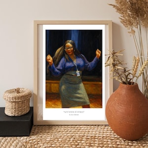 May include: A framed art print featuring a woman dancing, wearing a blue blouse and gray skirt. The print includes the text "NOT TODAY JUVENILE!" by Noi Coleman. The artwork is displayed on a woven rug.
