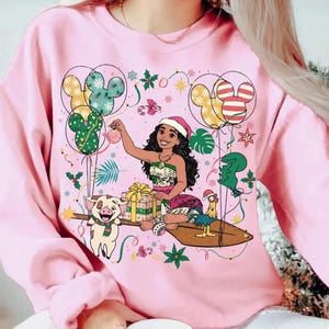 May include: A white ceramic mug with a black handle and the text "But First, Coffee" in a bold, black font. The mug is set against a blurred background, highlighting its clean design.