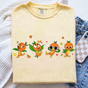 May include: A set of three ceramic nesting bowls in shades of blue, green, and white. The bowls feature a speckled glaze and a simple, modern design. The largest bowl measures approximately 6 inches in diameter.