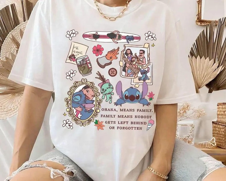 Peut inclure: T-shirt blanc avec un motif graphique color&eacute; repr&eacute;sentant des personnages de dessins anim&eacute;s et le texte "OHANA, MEANS FAMILY. FAMILY MEANS NOBODY GETS LEFT BEHIND OR FORGOTTEN." Le motif comprend un portrait encadr&eacute; et d'autres illustrations.