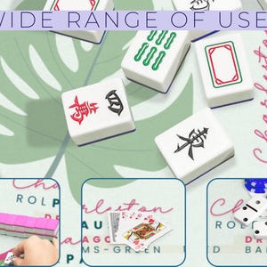 May include: White Mahjong tiles with red, green, and black symbols are displayed on a green leaf-patterned surface. The image includes the text "WIDE RANGE OF USES" and a close-up of playing cards and dominoes.
