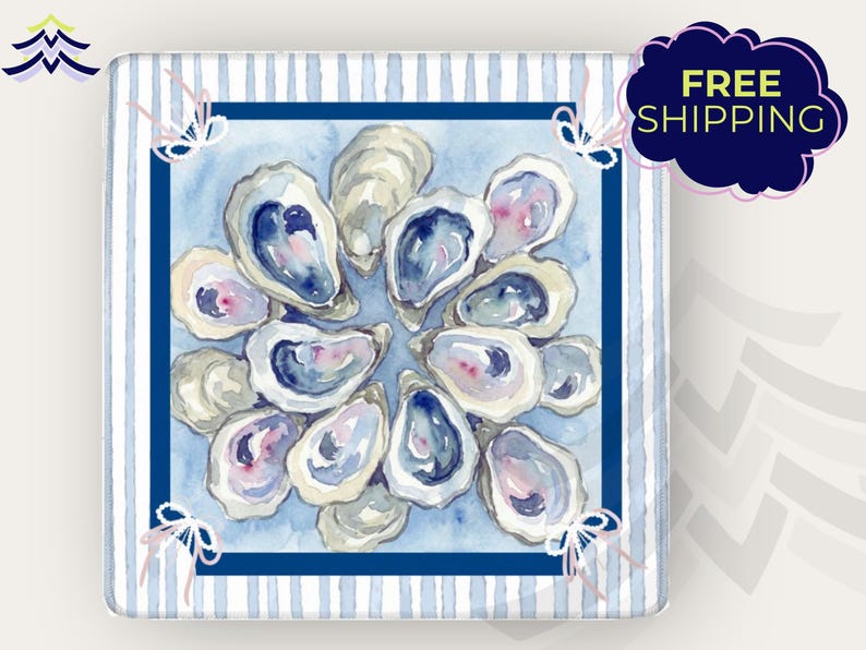 May include: Square decorative item with a watercolor painting of oysters arranged in a circle. The painting has blue, white, and pink hues. The background features blue and white stripes, with a dark blue border. The text "FREE SHIPPING" is in a dark blue bubble.
