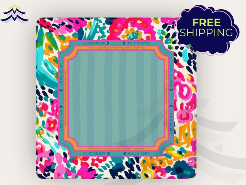 May include: A square, colorful decorative item with a floral pattern in pink, blue, and yellow. The center has a light blue striped design framed by a decorative border. Text includes "PLAY RIGHT" and "WALLS LEFT".