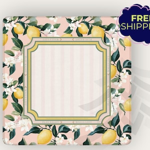 May include: Square, floral-patterned decorative item with a pink background and a lemon and flower design. The center has a striped pattern with a gold-trimmed frame. The text "PLAY RIGHT" and "WALLS LEFT" is visible.