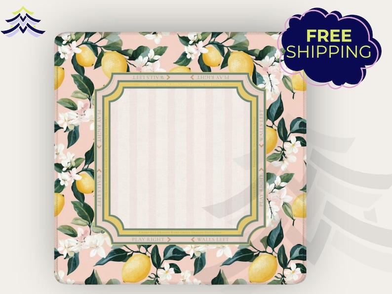 May include: Square, floral-patterned decorative item with a pink background and a lemon and flower design. The center has a striped pattern with a gold-trimmed frame. The text "PLAY RIGHT" and "WALLS LEFT" is visible.