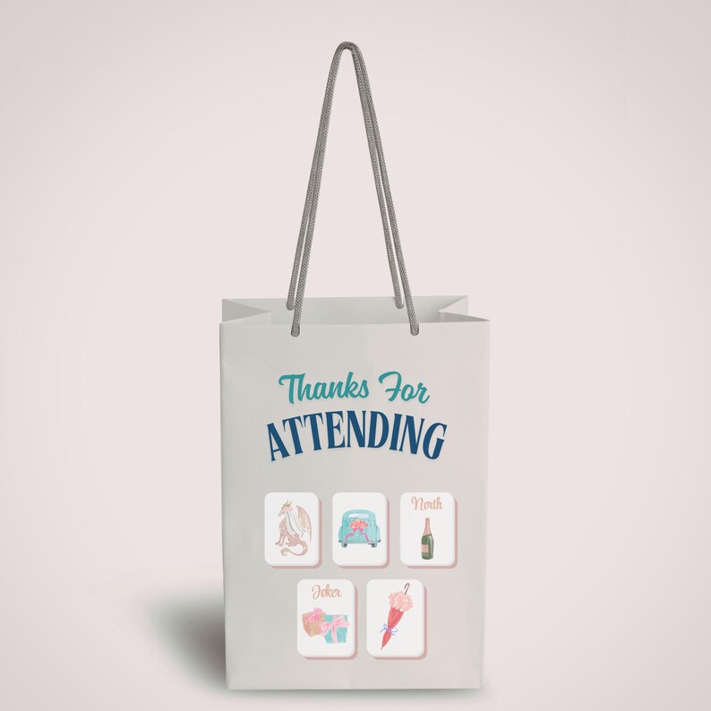 May include: A white gift bag with gray rope handles. The bag features the text "Thanks For ATTENDING" in teal and navy blue. Below are five small illustrations of a dragon, car, champagne bottle, gifts, and a parasol.