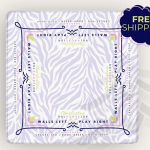 May include: A square, decorative item with a zebra stripe pattern in white and light purple. The item has a border with text that reads "Charleston" and "Walls Left Play Right". A dark blue cloud shape with the words "FREE SHIPPING" is in the upper right corner.