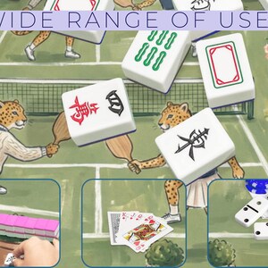 May include: An illustration showcasing a variety of games. The image features Mahjong tiles, playing cards, and dominoes. The text "WIDE RANGE OF USES" is displayed at the top. The background depicts a tennis court with cheetah-like figures playing.