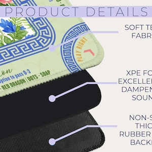 May include: A close-up of a mousepad with a floral design and blue Greek key border. The mousepad has a soft tech fabric, XPE foam for sound dampening, and a non-slip rubber foam backing. Text on the mousepad reads "Charleston".