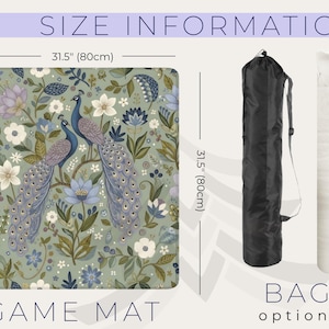 May include: A game mat with a floral peacock design, measuring 31.5 inches (80cm) square. The mat features a sage green background with blue, purple, and white flowers. A black bag and a white rolled item are shown as options.