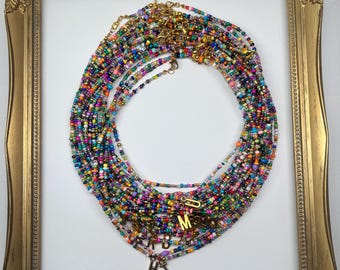 Gold and silver initial seed bead necklace