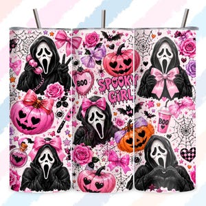 May include: A cylindrical tumbler featuring a repeating pattern of figures in black hooded robes with white ghost masks, pink pumpkins with heart-shaped eyes, pink bows, roses, spiderwebs, bats, and a cup labeled BOO, with the text SPOOKY GIRL.