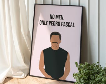 May include: A framed art print with the text "NO MEN. ONLY PEDRO PASCAL" above a stylized illustration of a man with a mustache. The print has a pink background and a black frame. The artwork is leaning against a white wall.
