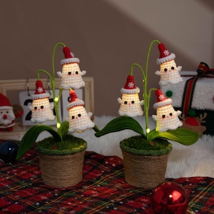 Planta de flor de Papá Noel tejida a crochet / Decoración navideña hecha a mano