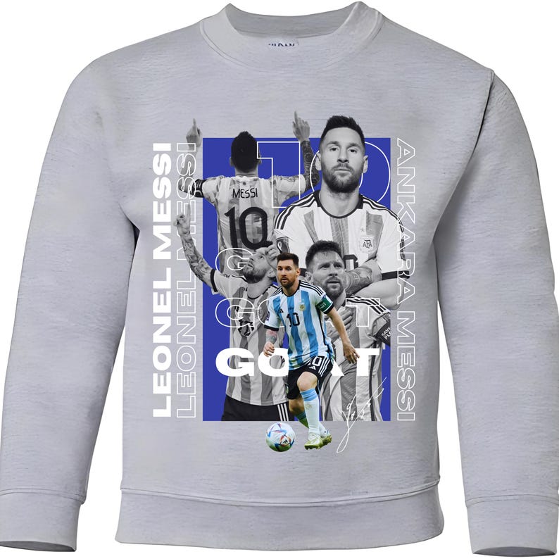 May include: A light grey sweatshirt with a design featuring multiple images of Lionel Messi, wearing the number 10. The design includes the text "LEONEL MESSI" and "ANKARA MESSI" in white, and the words "GO IT".