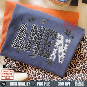 Amen PNG Christian fall design in black and gray patchwork letters on folded tee