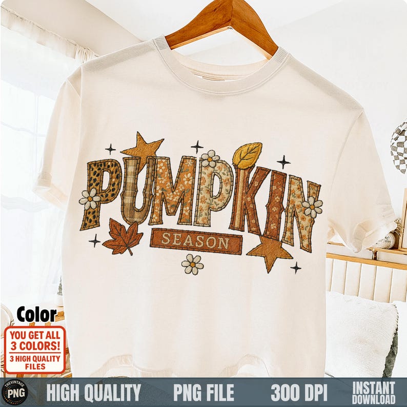 Hanging white shirt with patchy fall letters spelling “Pumpkin Season”