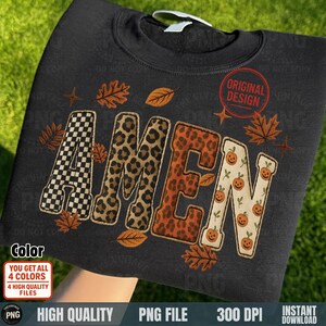 Amen PNG applique embroidery fall design folded on black sweatshirt