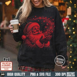 May include: Black sweatshirt featuring a red Santa Claus design blowing snowflakes. The design includes a red Santa hat, beard, and suit. The sweatshirt has the text "Red" and "Original Design" on it. The image also includes the text "PNG & SVG File" and "Instant Download".