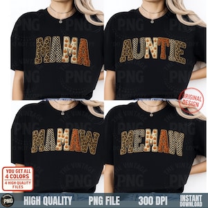 May include: Black t-shirts with the words "MAMA", "AUNTIE", "MAMAW", and "NEMAW" in a mix of leopard print, checkered, and pumpkin-themed lettering. The shirts are part of a fall-themed collection.
