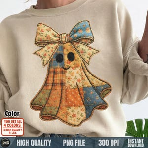 May include: Beige sweatshirt featuring a patchwork ghost design with a large bow. The ghost is made of various floral and plaid fabrics in orange, blue, and yellow. The text "Color" and "YOU GET ALL 4 COLORS" is visible.
