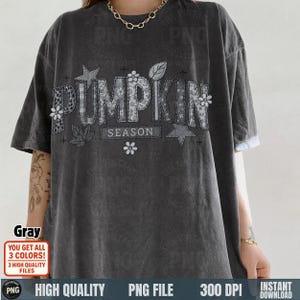 Grayscale version of “Pumpkin Season” patchwork sublimation on gray shirt