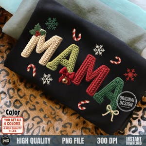 May include: Black sweatshirt with the word "MAMA" in a knitted style, featuring red, green, and cream-colored letters. The design includes snowflakes, candy canes, and a bow. The image also includes the text "Color", "Original Design", and "High Quality PNG File".