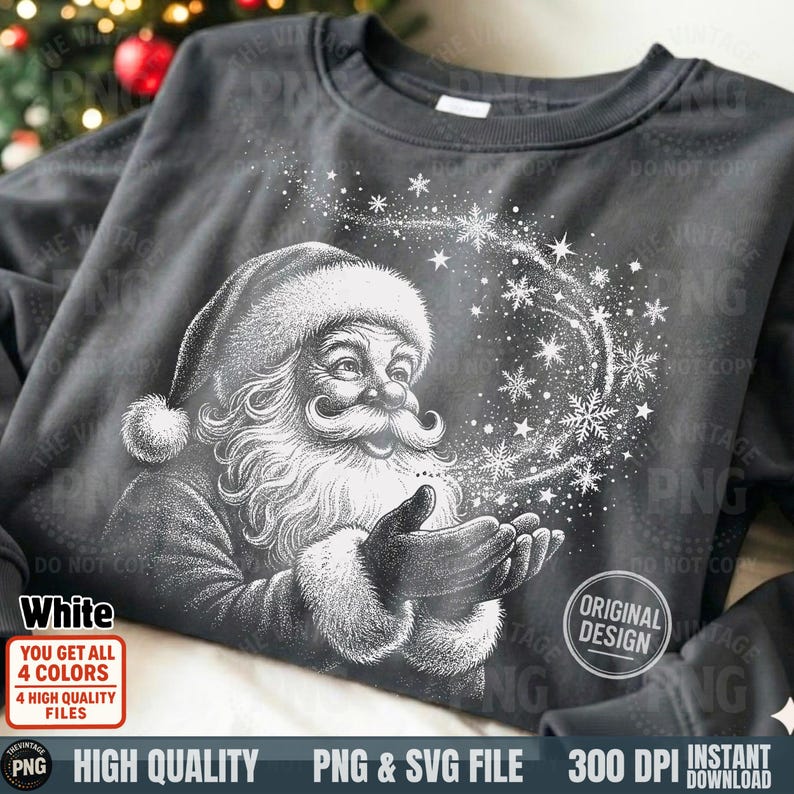 Flat lay of a dark charcoal t-shirt with the white "Santa Snow Magic" sketch design.