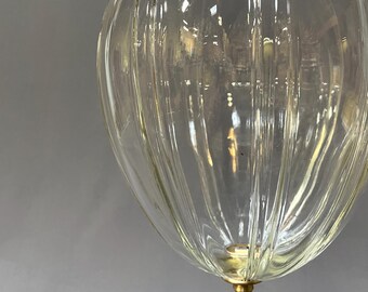 Hand blown ribbed glass pendant with all new solid brass hardware. A sculptural blend of vintage elegance and modern simplicity.