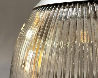 Pair of vintage Holophane glass dome pendants with ribbed texture and satin aluminum tops. Fully rewired and ready to install.