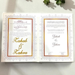May include: Open wedding invitation with gold foil text and ornate borders. The invitation includes Arabic script and the names "Zahab & Zahra". The date "20th day of December 2025" is also visible.