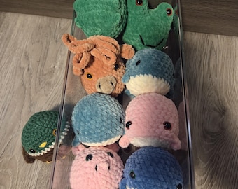 Crochet Amigurumi stress balls w/ foam balls inside. Frogs, whales, pigs, cows, ducks